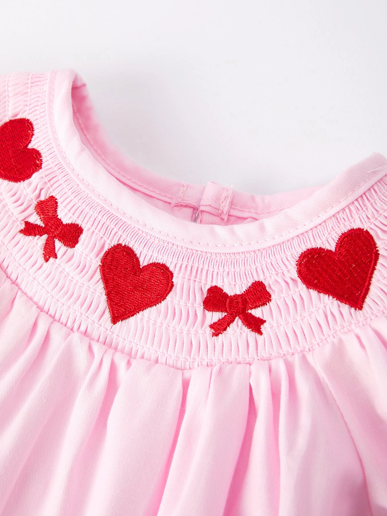 Pink Smocked Embroidered Long Sleeve Romper